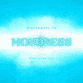 a blue sign that says welcome udn on a dark background