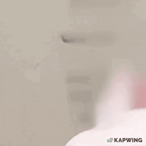 a close up of a person 's face with a white shirt on against a white background .