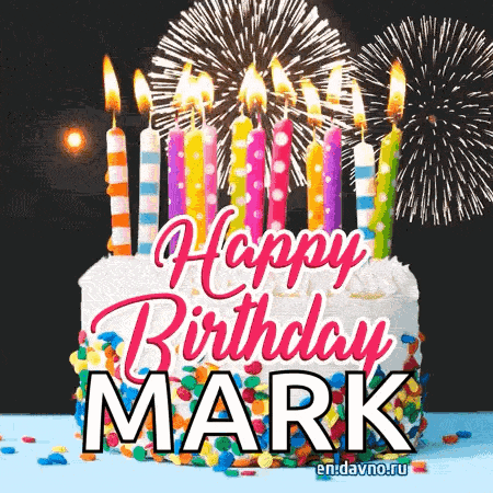 a birthday cake with candles and fireworks in the background .