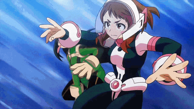 a girl in a helmet is standing next to another girl