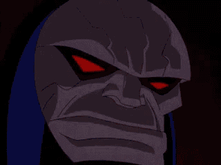 a close up of a cartoon character 's face with fire in his eyes .
