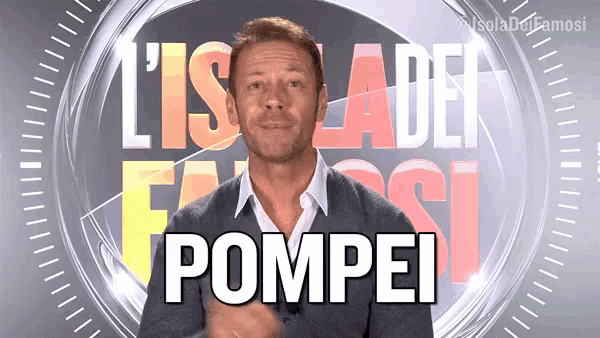 a man stands in front of a sign that says " pompei "