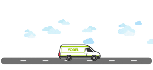 a white van with the word yodel on the side is driving down the road