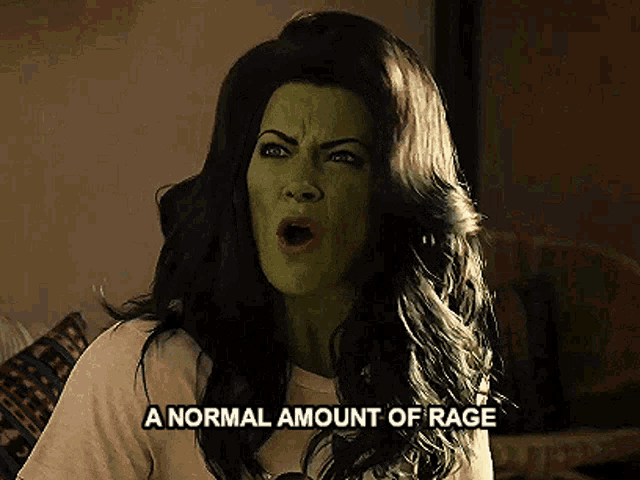 a woman with green hair is making a face and saying a normal amount of rage .