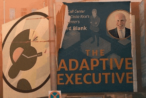 a billboard that says the adaptive executive with a picture of a man on it