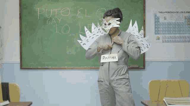 a woman in a classroom with a sign that says paloma on it
