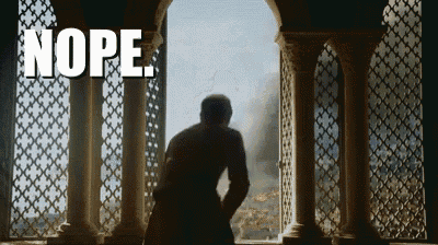a man is standing in front of a window with the word nope written above him