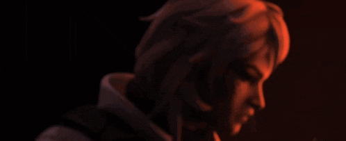 a blurred image of a person 's face with a red background
