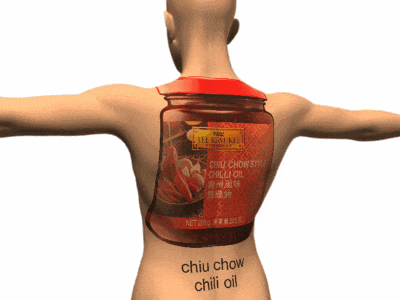 a jar of lee kum kee chili oil is on the back of a person
