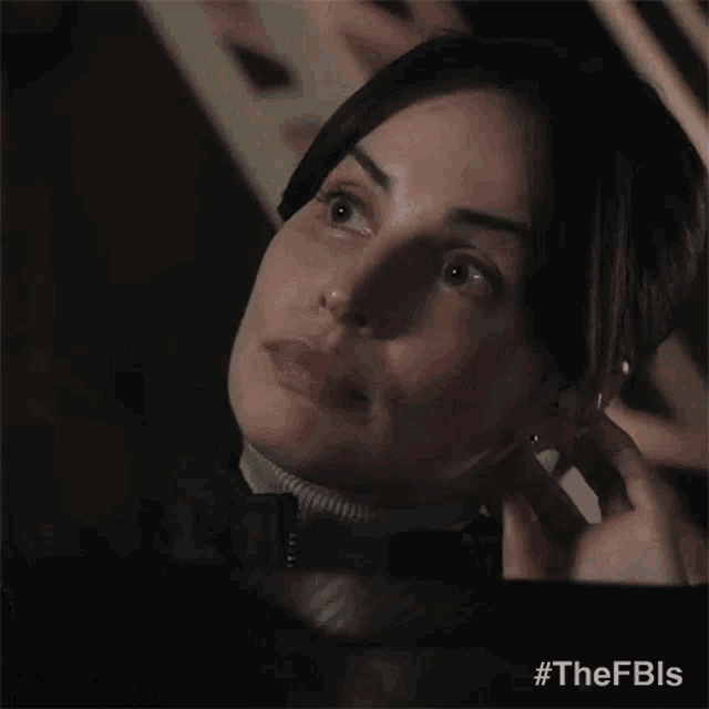 a close up of a woman 's face says no