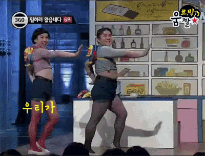 two people are dancing in front of a sign that says 360 on it