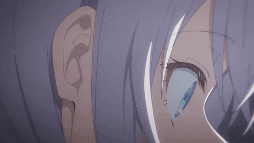 a close up of a girl 's blue eyes with a white outline