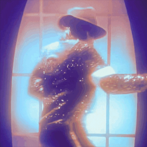 a silhouette of a man in a hat dancing in front of a window