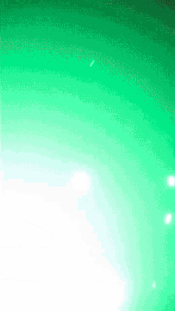 a green and white background with a few white dots