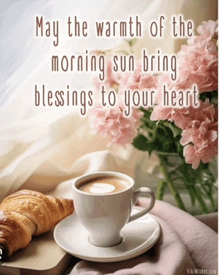 a picture of a cup of coffee and a croissant with the words may the warmth of the morning sun bring blessings to your heart below it