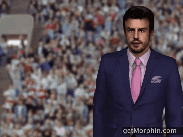 a man in a blue suit and pink tie stands in front of a crowd with the website getmorphin.com in the corner