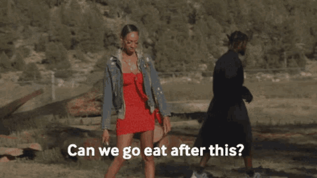 a woman in a red dress is standing in a field with the words can we go eat after this