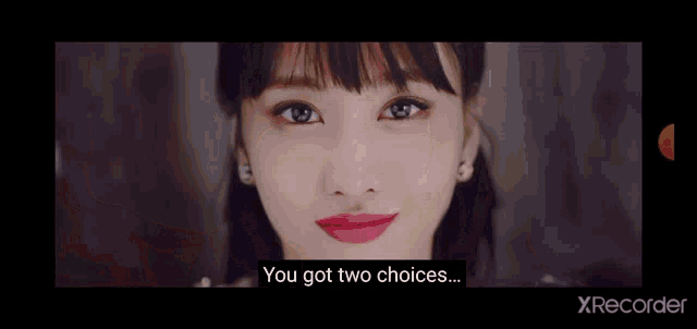 a close up of a woman 's face with a caption that says `` you got two choices . ''