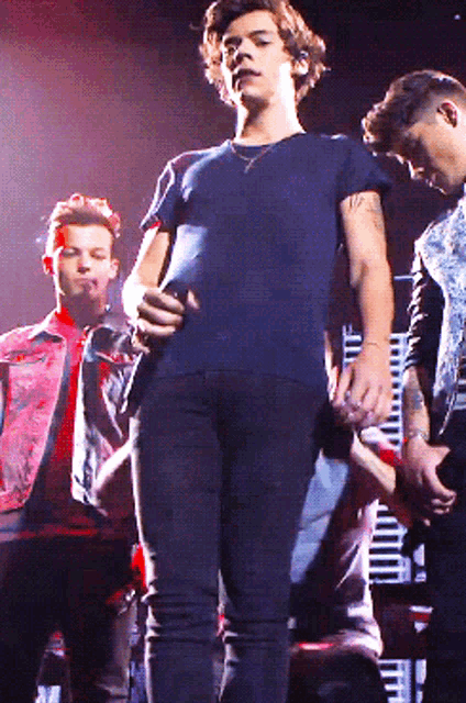 a man with a tattoo on his arm that says ' harry ' on it