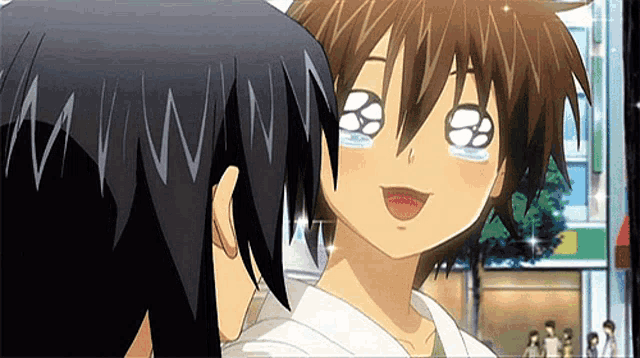 a couple of anime characters are standing next to each other and one has tears running down his face