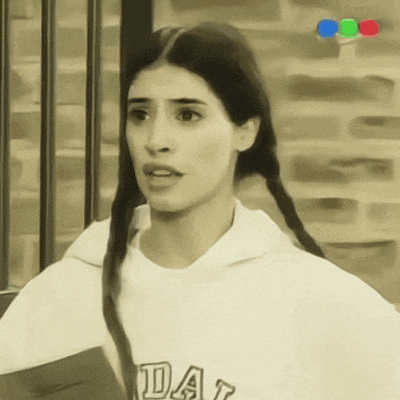 a woman wearing a white sweatshirt that says day on it