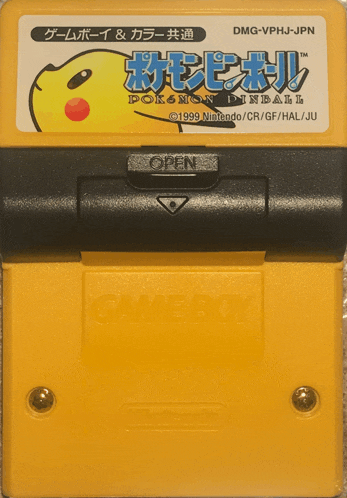 a yellow game boy cartridge that says pokemon dinball on it