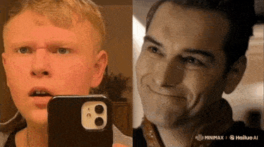a man is taking a selfie with his phone next to another man who is smiling .