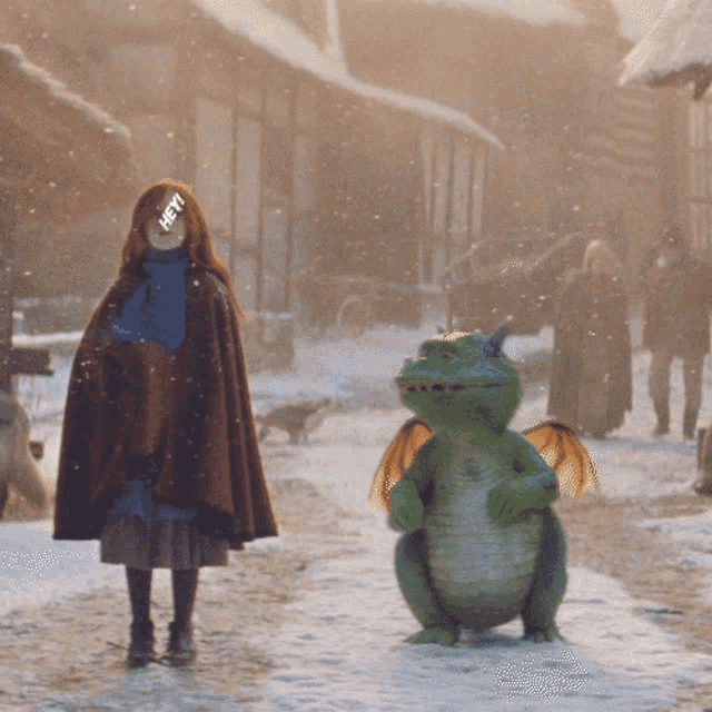 a woman in a brown cape stands next to a green dragon with the word hey on her face