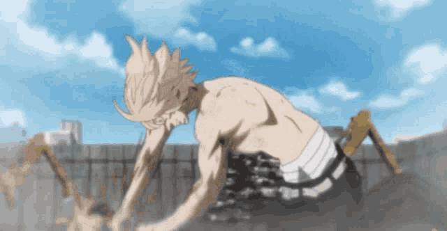 a man without a shirt is crawling on the ground in a cartoon scene .