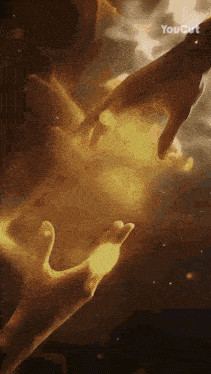 a couple of hands reaching for each other in the dark .