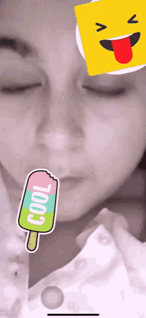 a close up of a woman 's face with a sticker that says cool on it