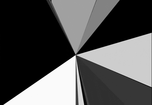 a black and white geometric pattern with a white center