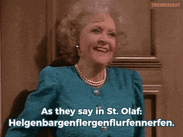 a woman in a blue dress and pearls says as they say in st. olaf helgenbargenflergenflurfennerfen