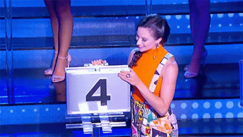 a woman holding a briefcase with the number four on it