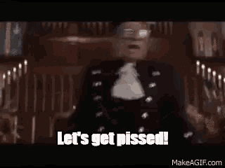 a man in a kilt is standing next to a woman and says `` let 's get pissed ! '' .
