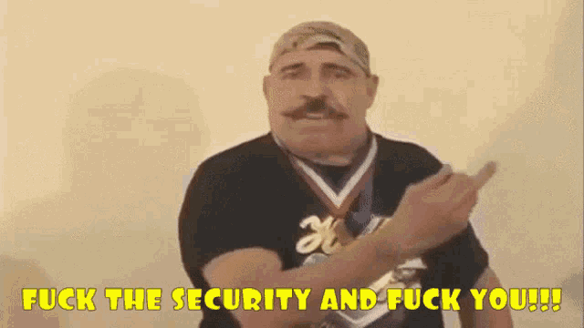 a man with a medal around his neck says " fuck the security and fuck you !!! "