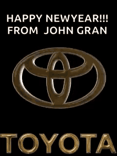 a toyota logo on a black background with the words happy new year from john gran toyota