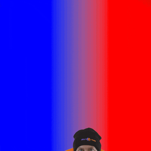 a man with a beard wearing an orange jacket and a black hat that says only a few hours