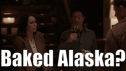 a man holding a glass of wine with the words baked alaska written below him