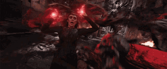 a dark room with red lights coming out of the ceiling