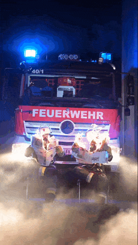 a fire truck with the word feuerwehr on the front of it