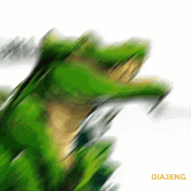 a blurred image of a green frog with the word diajeng in the corner