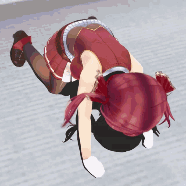a girl with red hair is laying on her back on the floor