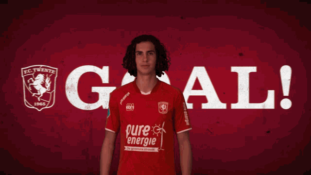 a soccer player wearing a red shirt with the number 31 on it