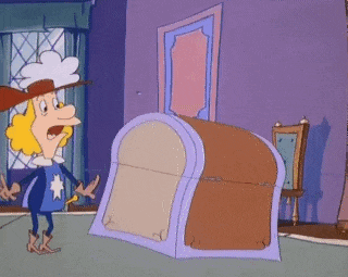 a cartoon character is standing next to a large trunk .