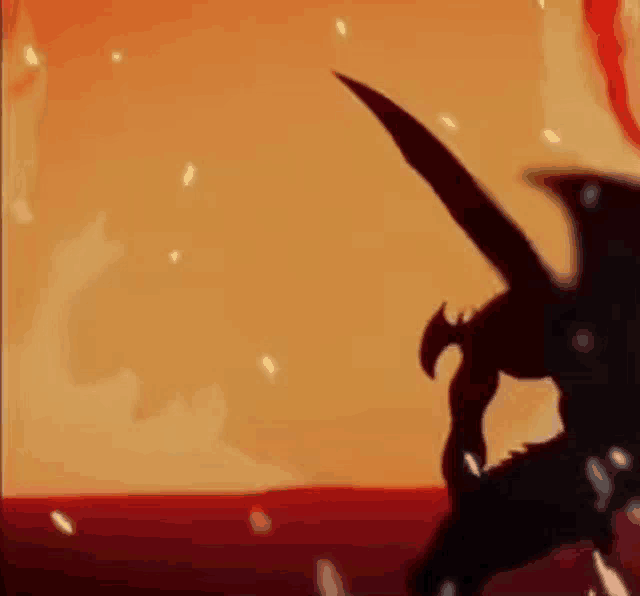 a silhouette of a dragon with wings standing in the middle of a fire .
