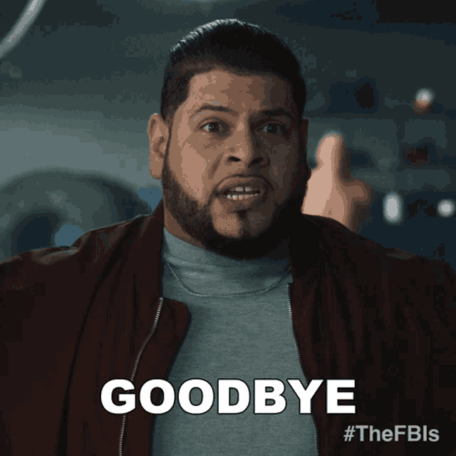 a man with a beard is saying goodbye in a video