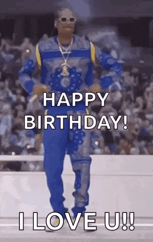 snoop dogg is dancing in front of a crowd and saying happy birthday .