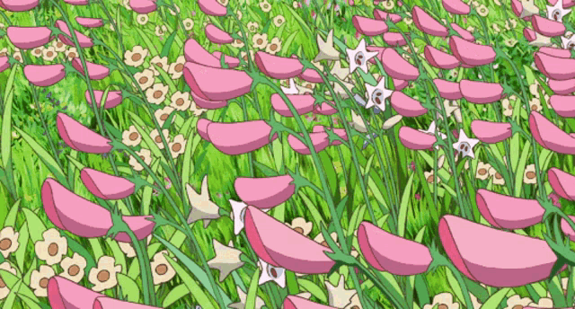 a bunch of pink flowers are growing in a field
