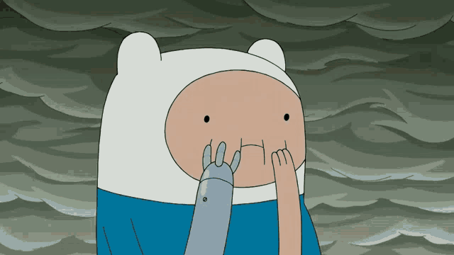 a cartoon character is covering his mouth with his finger